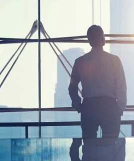 Adamsons leadership looking out over the city — corporate vision